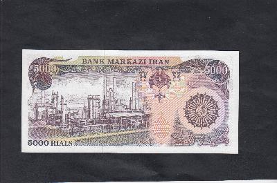 Beschrijving achterzijde: REFINERY